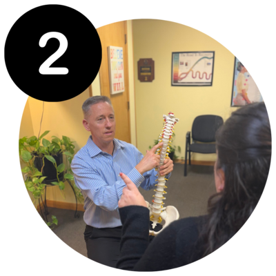 Dr. Malba Educating a Patient